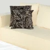 Black, Off-White, and Beige Animal Print Pillow